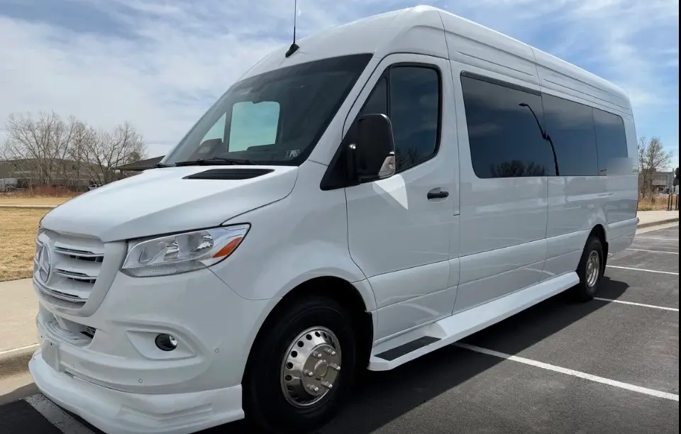 Colorado Springs 16 passenger white Sprinter limo bus